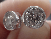 Image 2 of STUNNING 18CT WHITE GOLD BRILLIANT CUT DIAMOND 1.50CT COLLET STUD EARRINGS