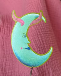 devil may moon sticker