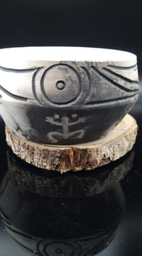 Image 1 of Traditional Taino horse hair and feather pot. 