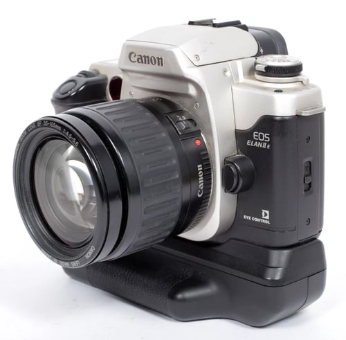 Image of Canon EOS ELAN IIE 35mm SLR Film Camera with 35-105mm zoom lens + GRIP #4401