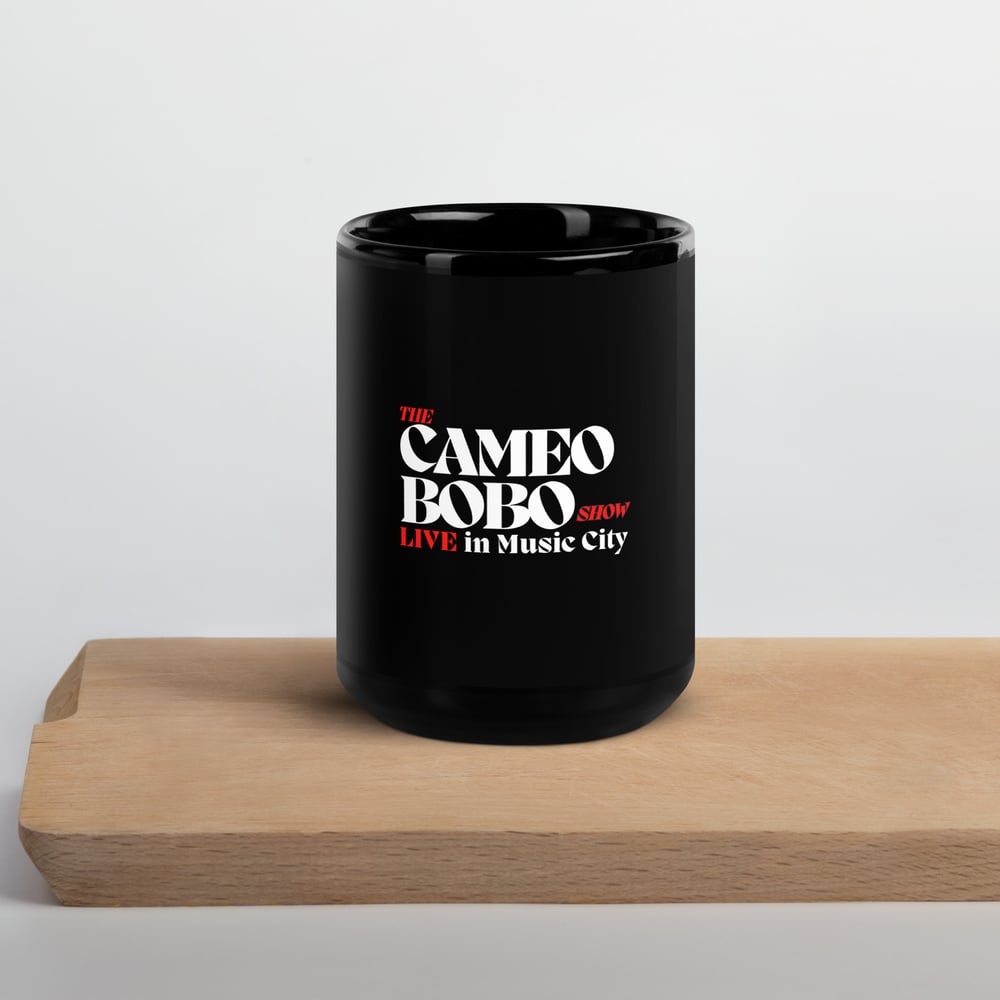 The Cameo Bobo Show Black Mug