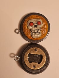 "Bottlecap Removal Device" (skull variant)