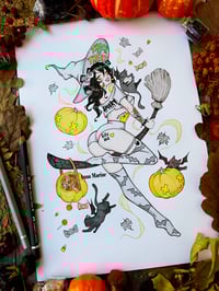 Pumpkins, cats and broomsticks