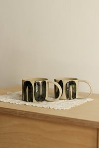 Image 1 of hakeme mug