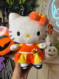 Image 1 of Hello kitty candy corn plushie 