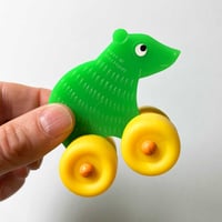 Image 1 of Mini ours vert à roulettes années 80