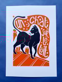Image 4 of Un chat noir sur le toit