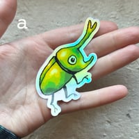 Image 2 of holographic beetle stickers