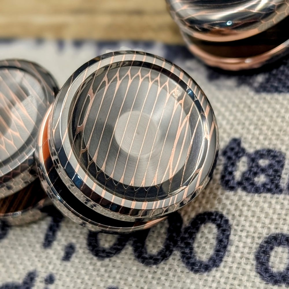 Button out of High Filament Superconductor Vertical Cut