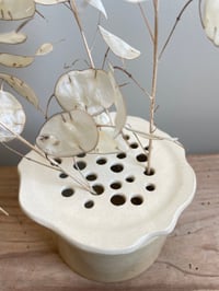 Image of Pique fleurs grès 