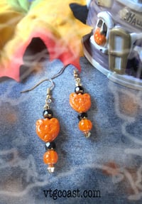 Image 1 of Orange and Black Cats