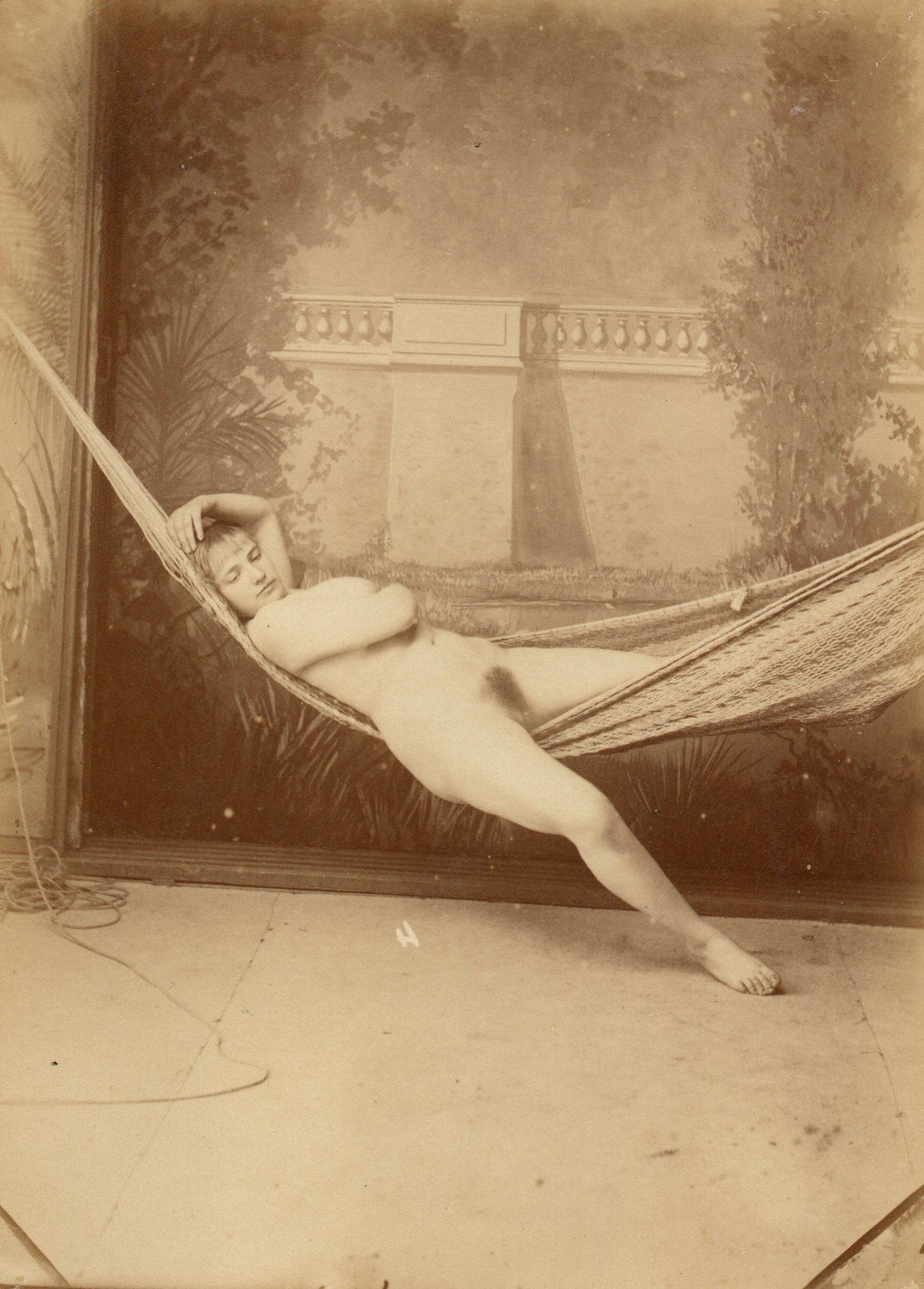 Image of Anonyme: naked woman in a hammock, ca. 1870