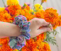 Image 2 of imelda dia de los muertos scrunchie