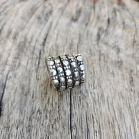 Image 1 of Ornate Coil, US 7