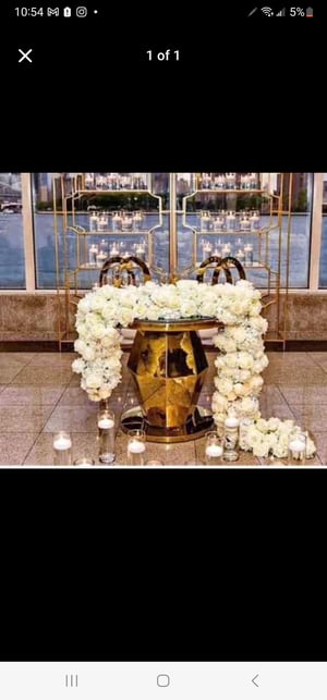 Image of Gold stainless steel wedding cake stand glass top