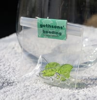 Image 3 of sage clear star earrings