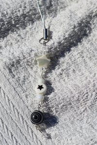 Image 3 of black and white keychain