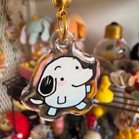 Image 2 of snoopygotchi phone charm