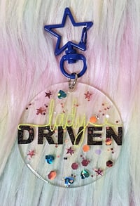 Lady Driven Glitter Explosion