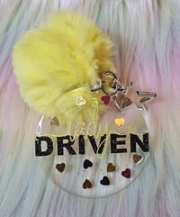 Lady Driven Yellow Poof