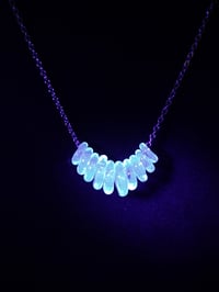 Image 1 of UV BLUE FIDGET NECKLACE 