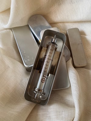 Image of Seringues anciennes en verre