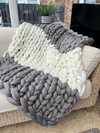 Image 1 of Giant Arm Knitted Blanket / Throw