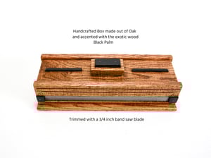 Image of Oak wood Keepsake Box accented with exotic Black Palmm edged with band saw blade, Wood Knife Box