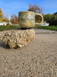 Image 1 of Big Golden Haze Mug- with black footed bottom