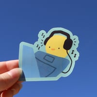 Image 1 of what's he listening to