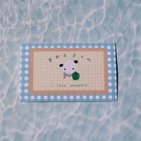 Image 2 of possum loves peppers