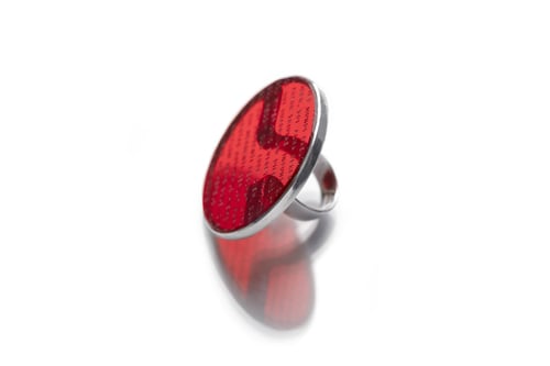 Image of "A fragment from Late Ancient Roman hymn to Sun.." silver ring with red acrylic glass 45mm