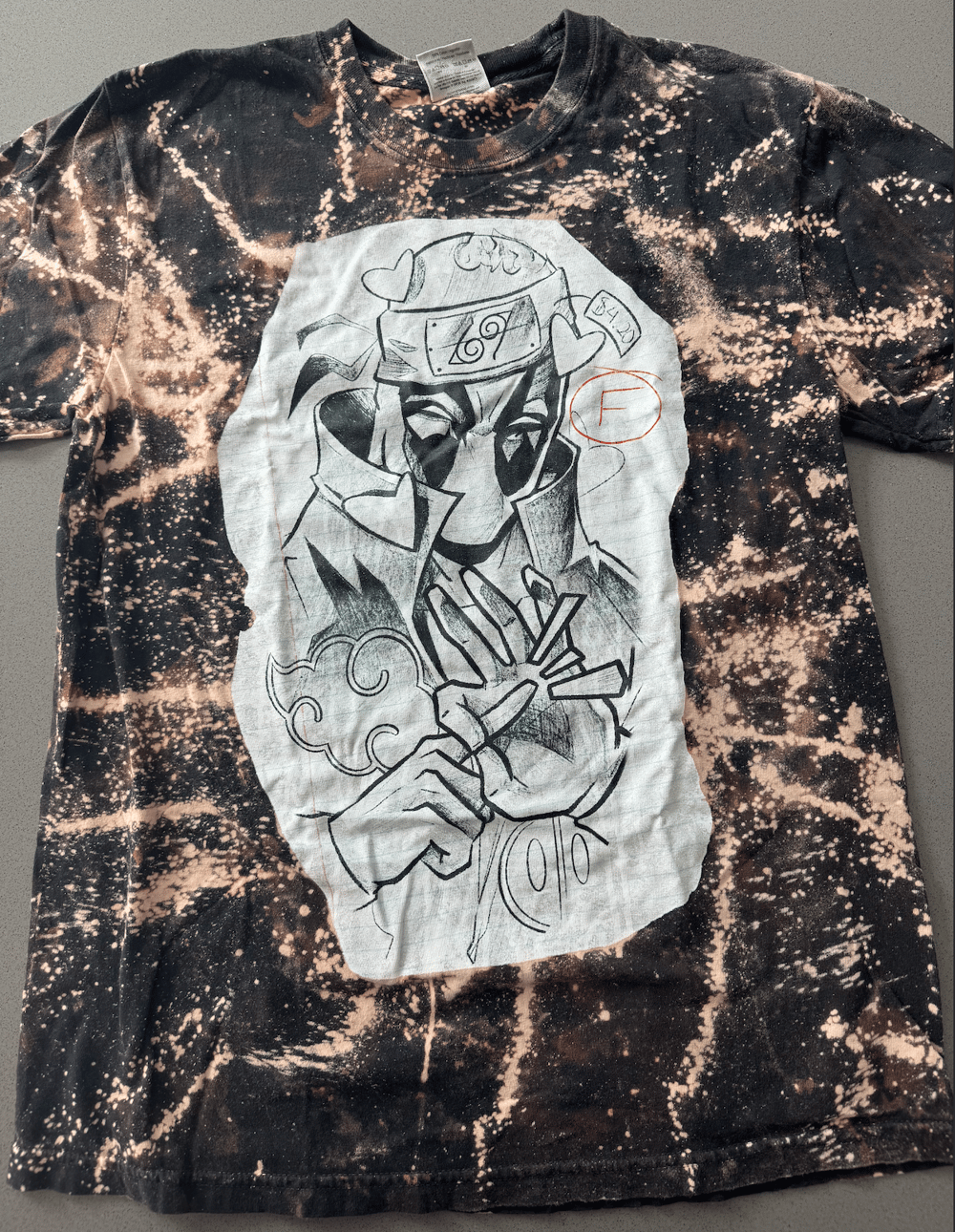 Image of 🥷🏻🧪❤️ Silly Goofy Anti Hero Anime Man Acid Washed Black Tee