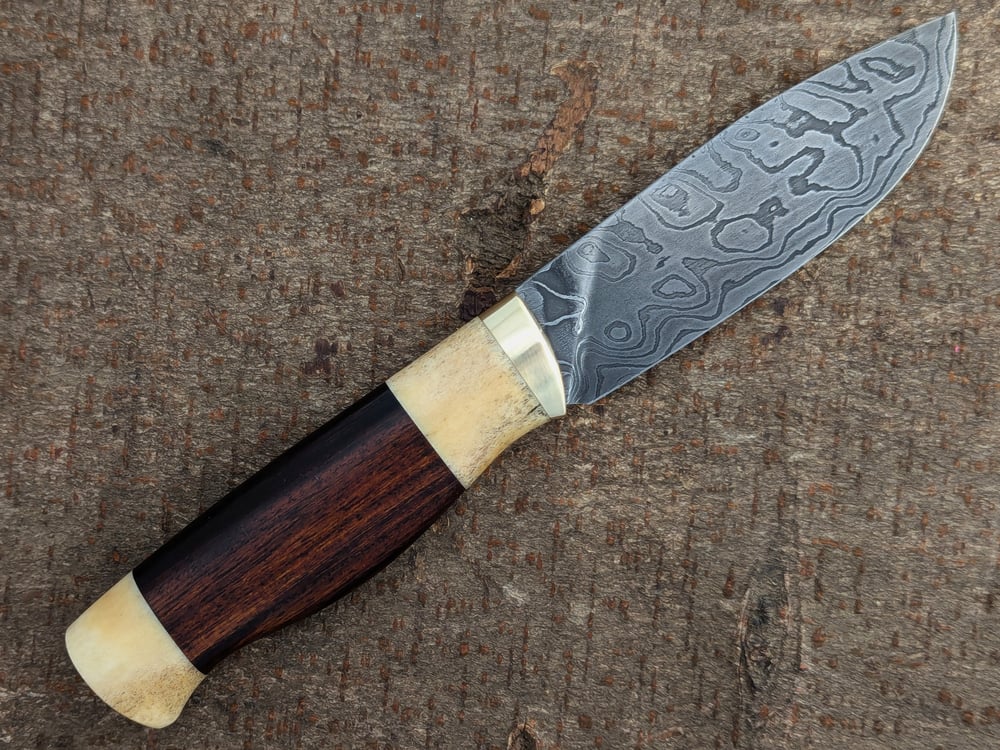 Image of Damascus bushcraft knife 