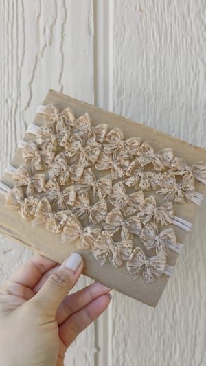 Image of Latte vintage lace multiple bows tiebacks