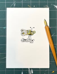 Image 2 of green and yellow insect