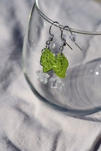 Image 2 of star and leaf earrings