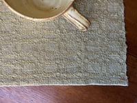 Image 1 of Handwoven Linen and Hemp Table Mat in M's and O's