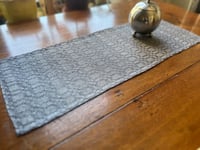 Image 2 of Handwoven Linen Wool and Ramie Table Mat in M's and O's