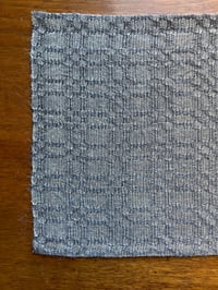 Image 4 of Handwoven Linen Wool and Ramie Table Mat in M's and O's
