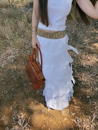 Image 1 of falda marrón volantes 