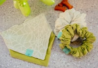 Image 1 of mystique glow in the dark reversible tie on espooky set