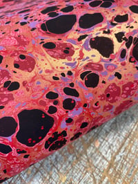 Image 1 of 'Molten Rock' // one-of-a-kind hand marbled paper on red base paper 