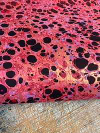 Image 4 of 'Molten Rock' // one-of-a-kind hand marbled paper on red base paper 