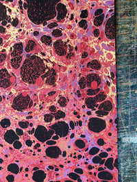 Image 5 of 'Molten Rock' // one-of-a-kind hand marbled paper on red base paper 