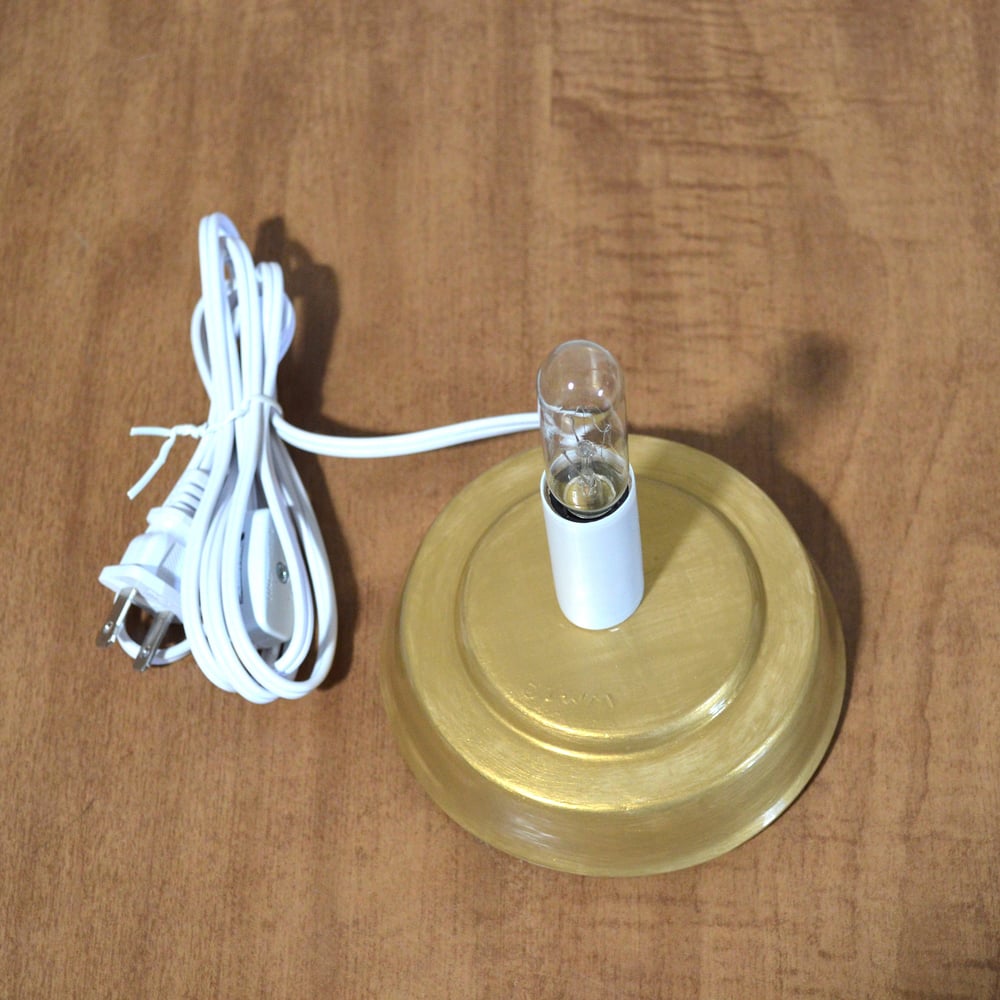 Image of Black Ceramic Lighted Halloween Tree With Gold Base and Various Ornaments