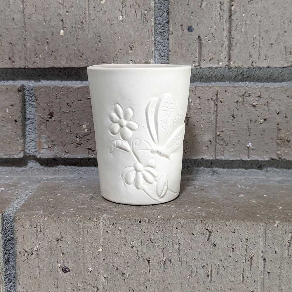 Image of Ceramic Bisque Butterfly &amp; Floral Embossed Cup Ready to Paint