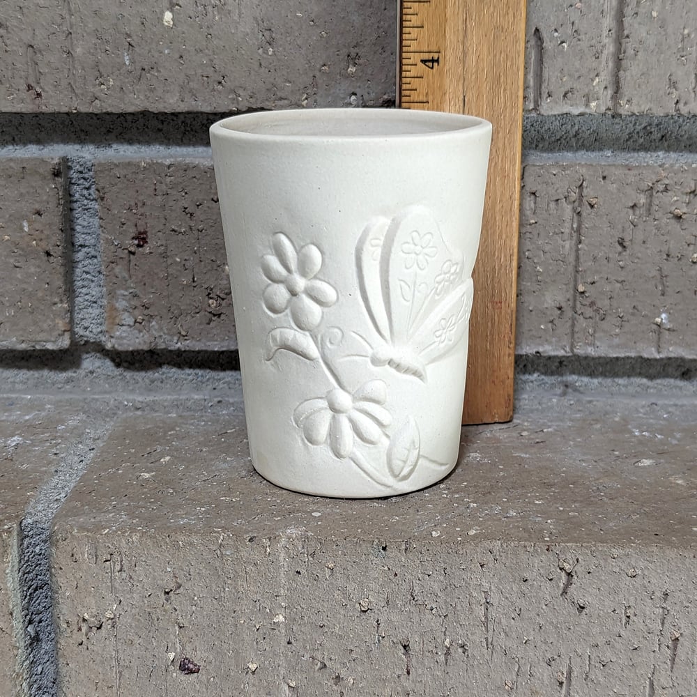 Image of Ceramic Bisque Butterfly &amp; Floral Embossed Cup Ready to Paint