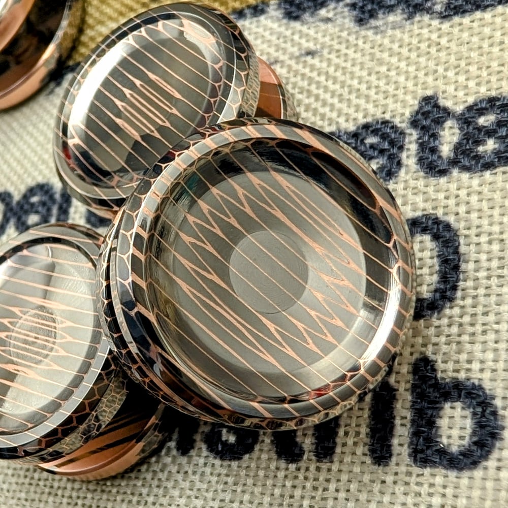 Button out of High Filament Superconductor Vertical Cut