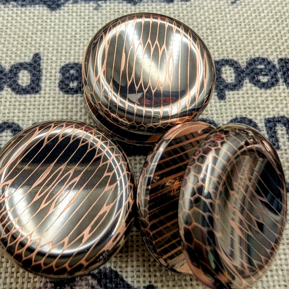 Button out of High Filament Superconductor Vertical Cut
